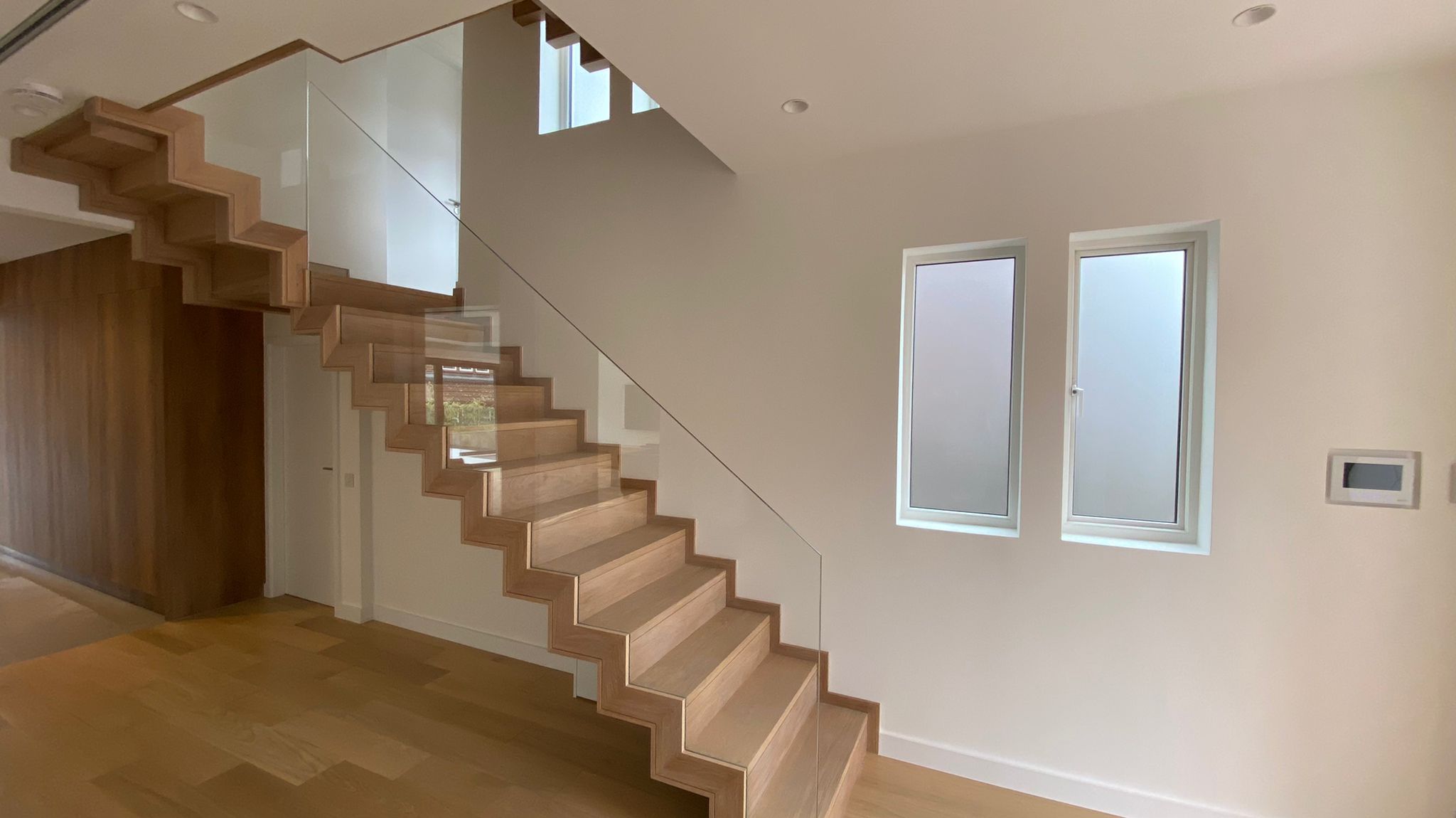 Dog-friendly bespoke staircase redesign Finchley House London